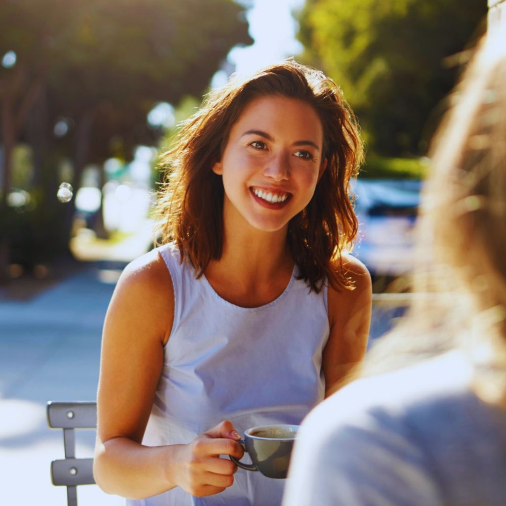 women talking over coffee